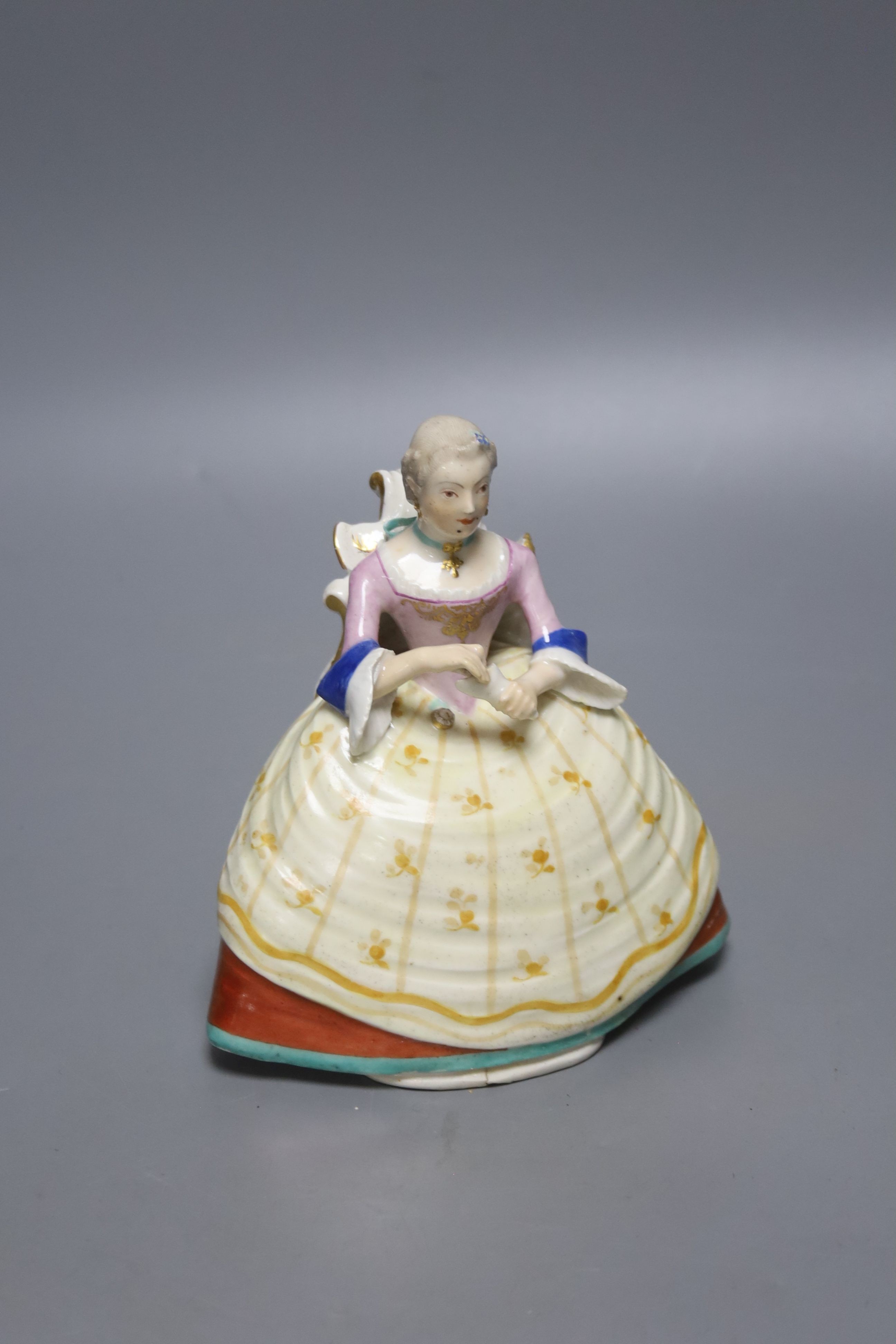 Two 18th century Vienna porcelain trays and a seated figure, largest tray 16cm